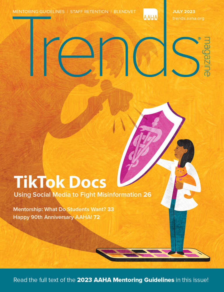 Cover of July 2023 Trends—A veterinarian standing on a phone and holding a cat. A shadow monster is coming out of the phone and the veterinarian is holding up a shield against it.
