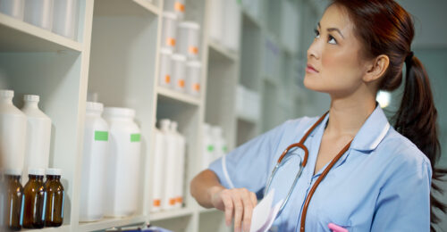 A veterinary team member doing an inventory audit.